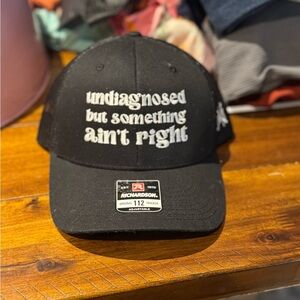 Richardson Black Trucker Cap with White Text
